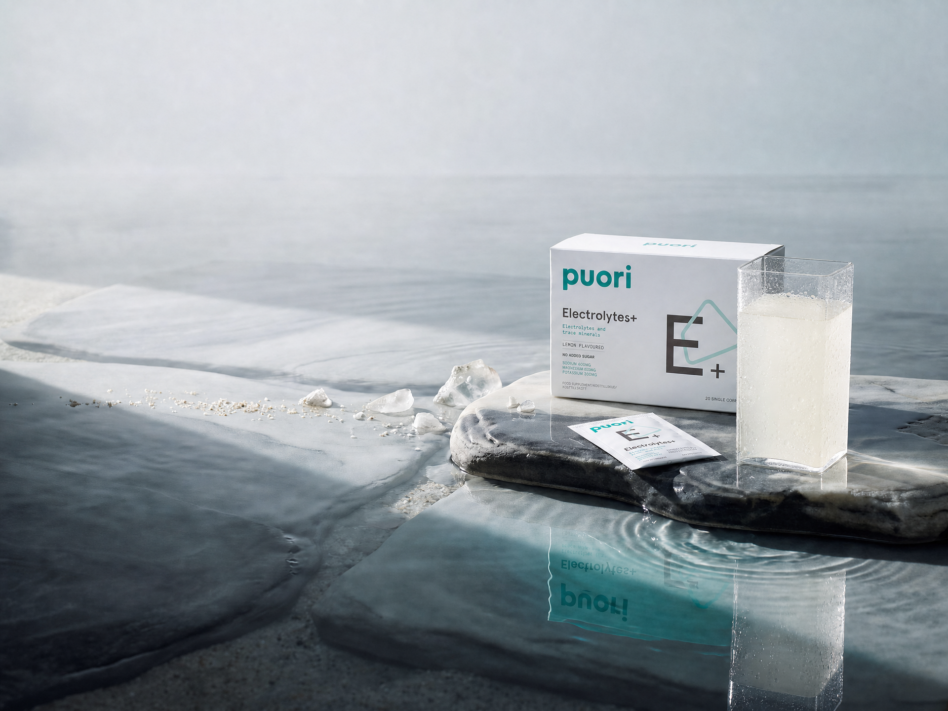 Puori Electrolytes+ beside clear water and elemental mineral forms